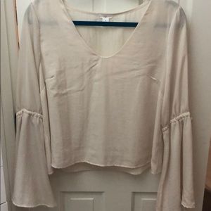 Cream blouse with bell sleeves